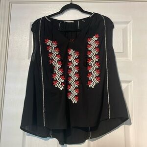 Ulla Johnson sleeveless black top with red and white embroidery tassels classic